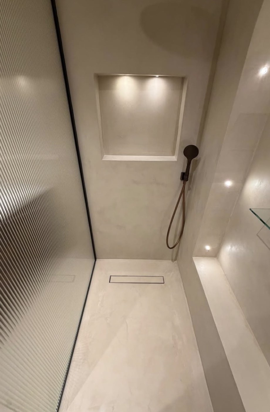 Recessed niche and shower lighting in a bathroom